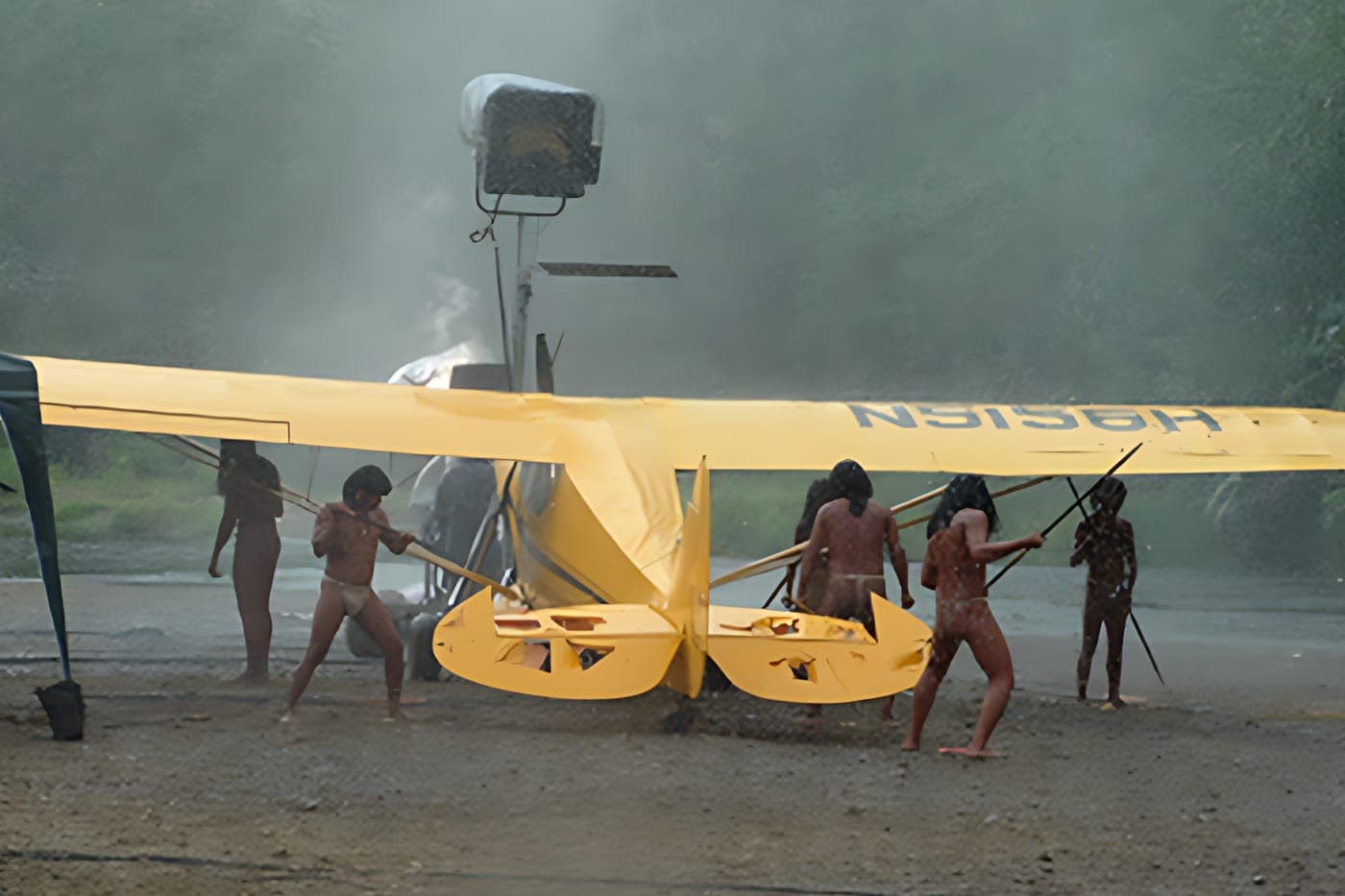 A yellow plane on set for End of the Spear