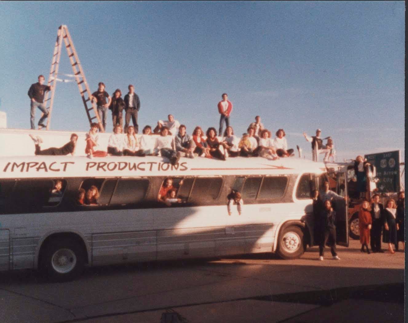 The Toymaker's Dream cast with their tour bus